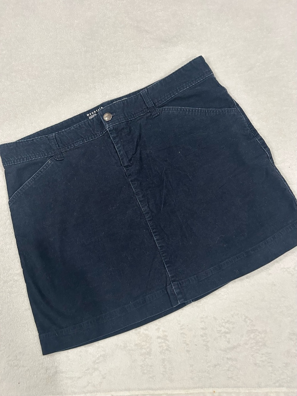 Mountain HardWear corduroy mini skirt size 14
Navy blue corduroy cotton utility